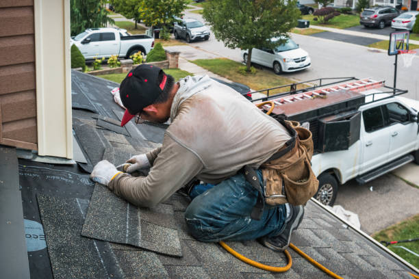 Professional Flat Roof Repair technician working in Brooker, FL